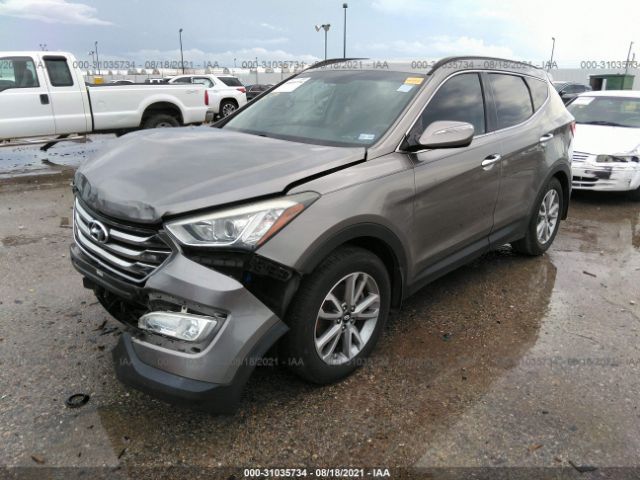 Photo 1 VIN: 5XYZU3LA0GG316424 - HYUNDAI SANTA FE SPORT 