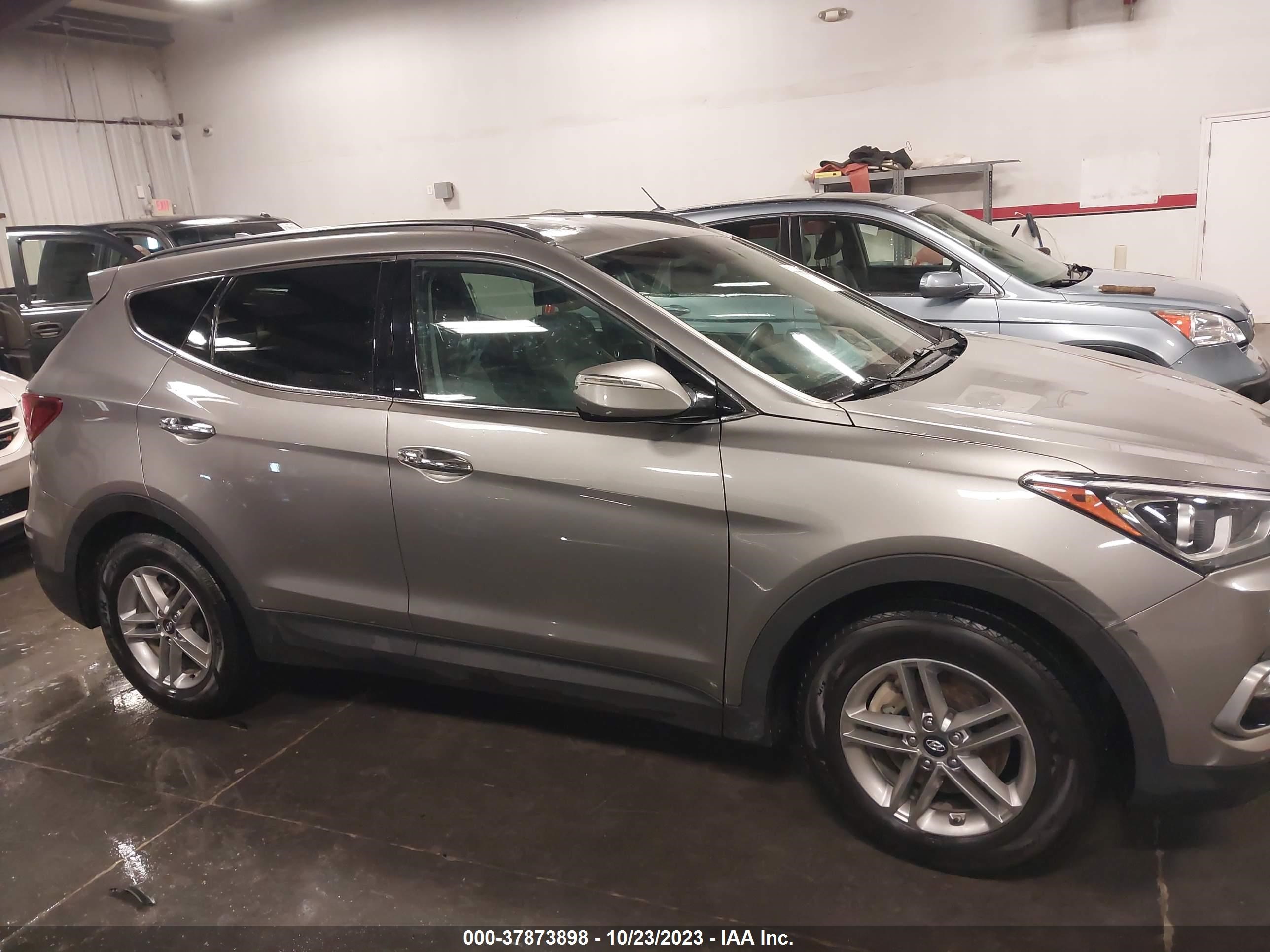 Photo 12 VIN: 5XYZU3LB0JG511911 - HYUNDAI SANTA FE 