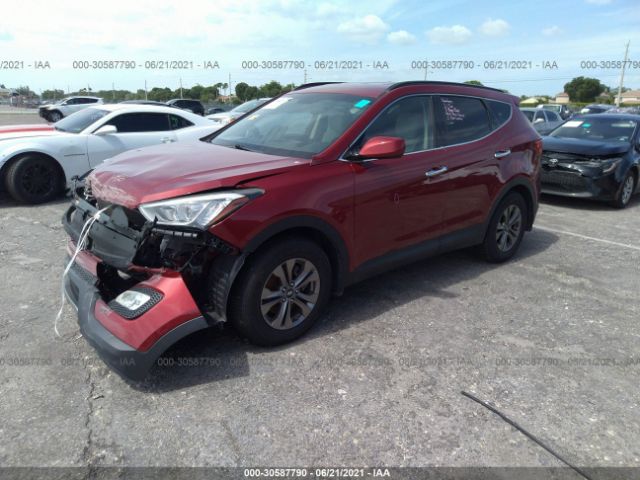 Photo 1 VIN: 5XYZU3LB2GG335811 - HYUNDAI SANTA FE SPORT 