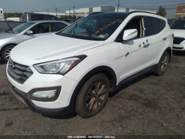 Photo 1 VIN: 5XYZU3LB8GG330712 - HYUNDAI SANTA FE SPORT 