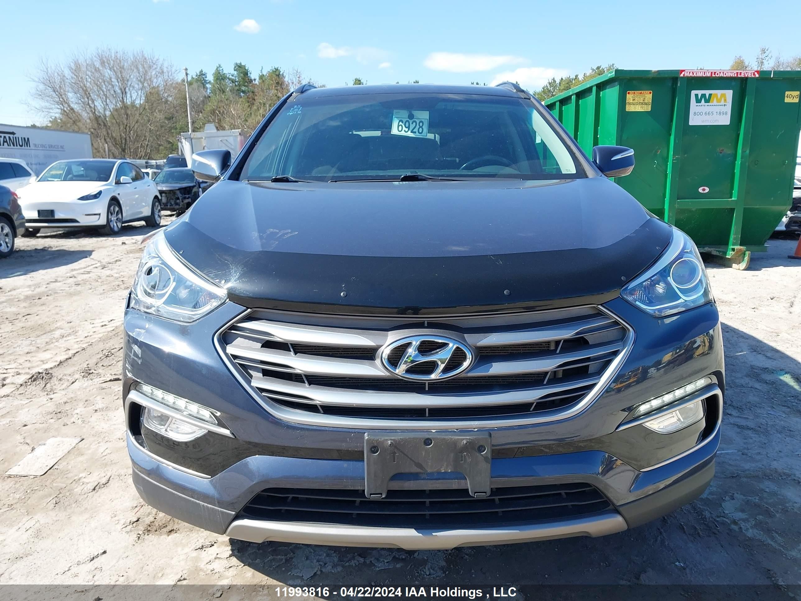 Photo 11 VIN: 5XYZU3LB8JG521120 - HYUNDAI SANTA FE 