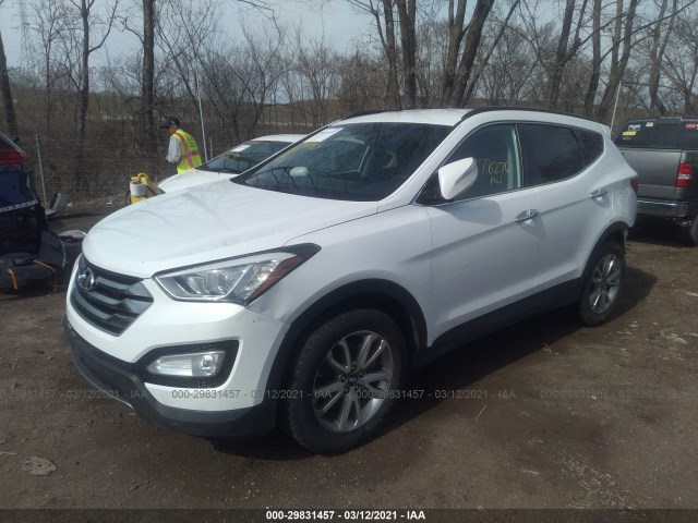 Photo 1 VIN: 5XYZUDLA2GG312879 - HYUNDAI SANTA FE SPORT 