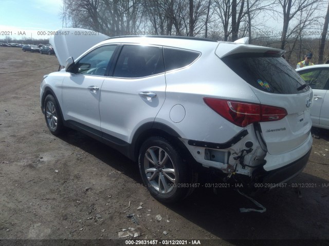 Photo 2 VIN: 5XYZUDLA2GG312879 - HYUNDAI SANTA FE SPORT 