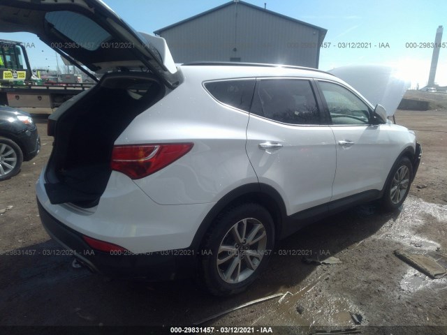 Photo 3 VIN: 5XYZUDLA2GG312879 - HYUNDAI SANTA FE SPORT 