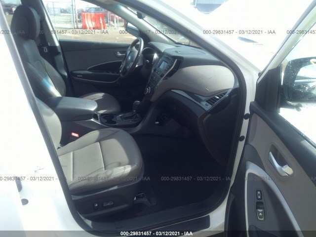 Photo 4 VIN: 5XYZUDLA2GG312879 - HYUNDAI SANTA FE SPORT 