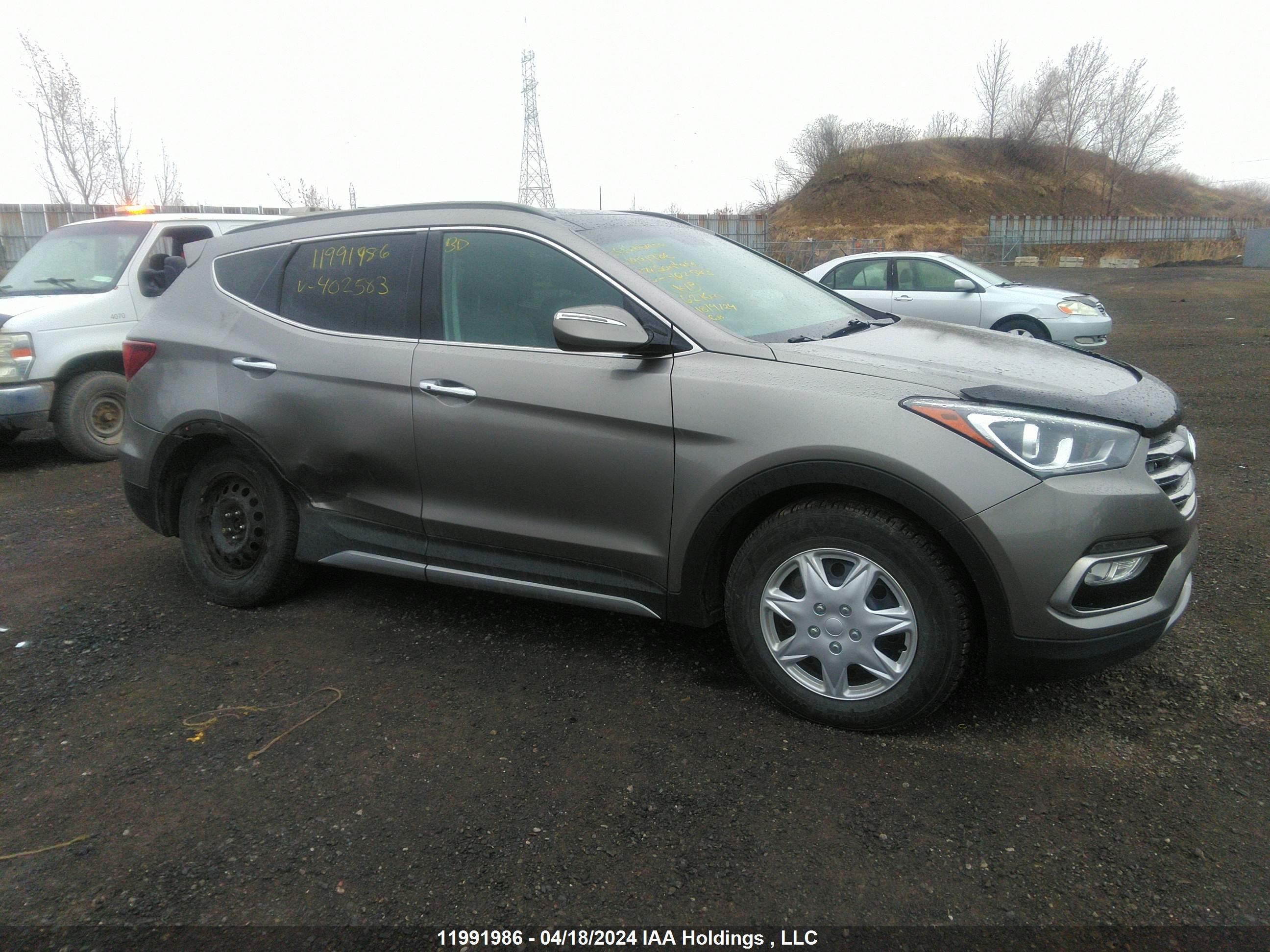 Photo 0 VIN: 5XYZUDLA2HG402583 - HYUNDAI SANTA FE 