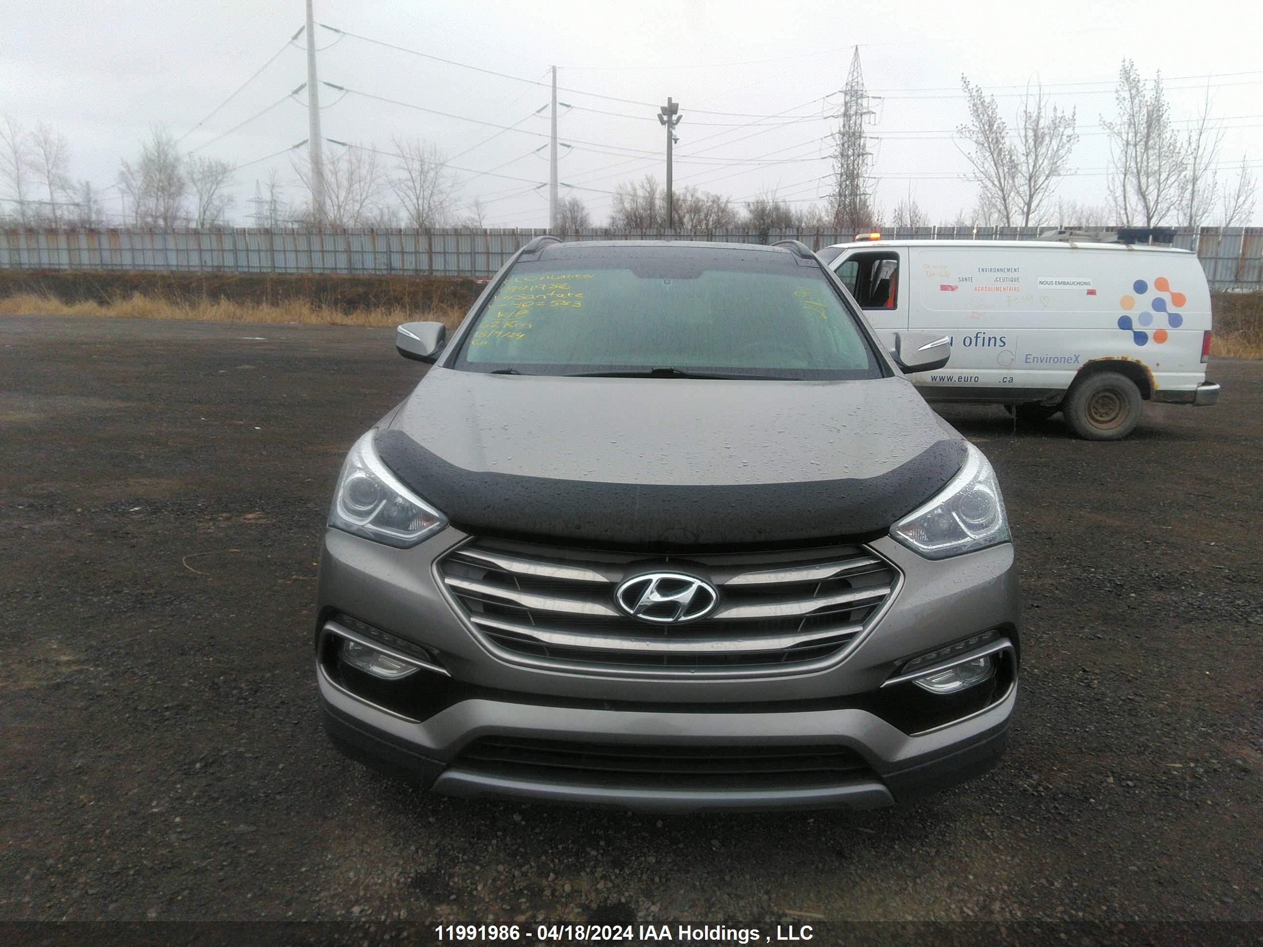 Photo 11 VIN: 5XYZUDLA2HG402583 - HYUNDAI SANTA FE 