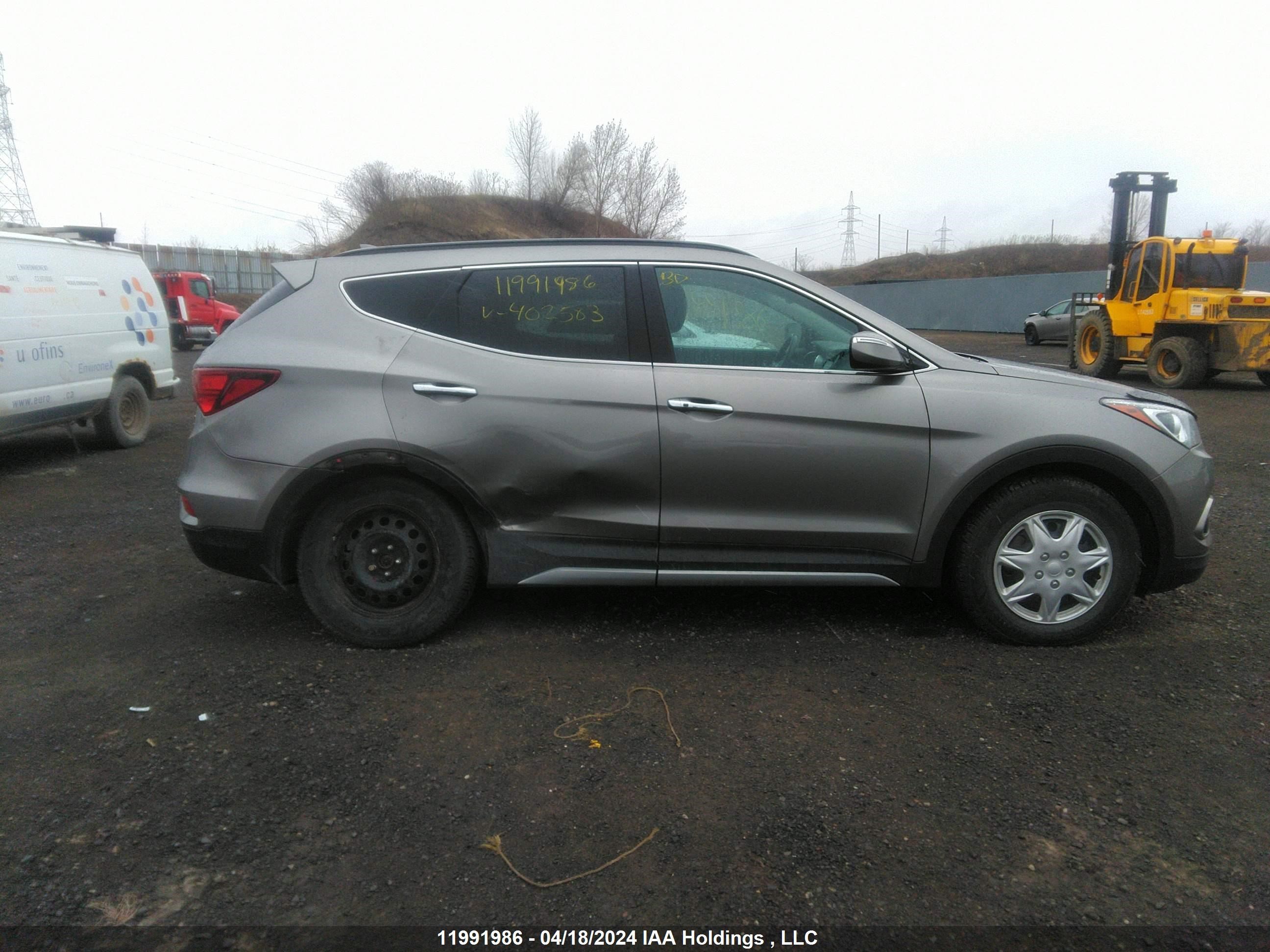 Photo 12 VIN: 5XYZUDLA2HG402583 - HYUNDAI SANTA FE 