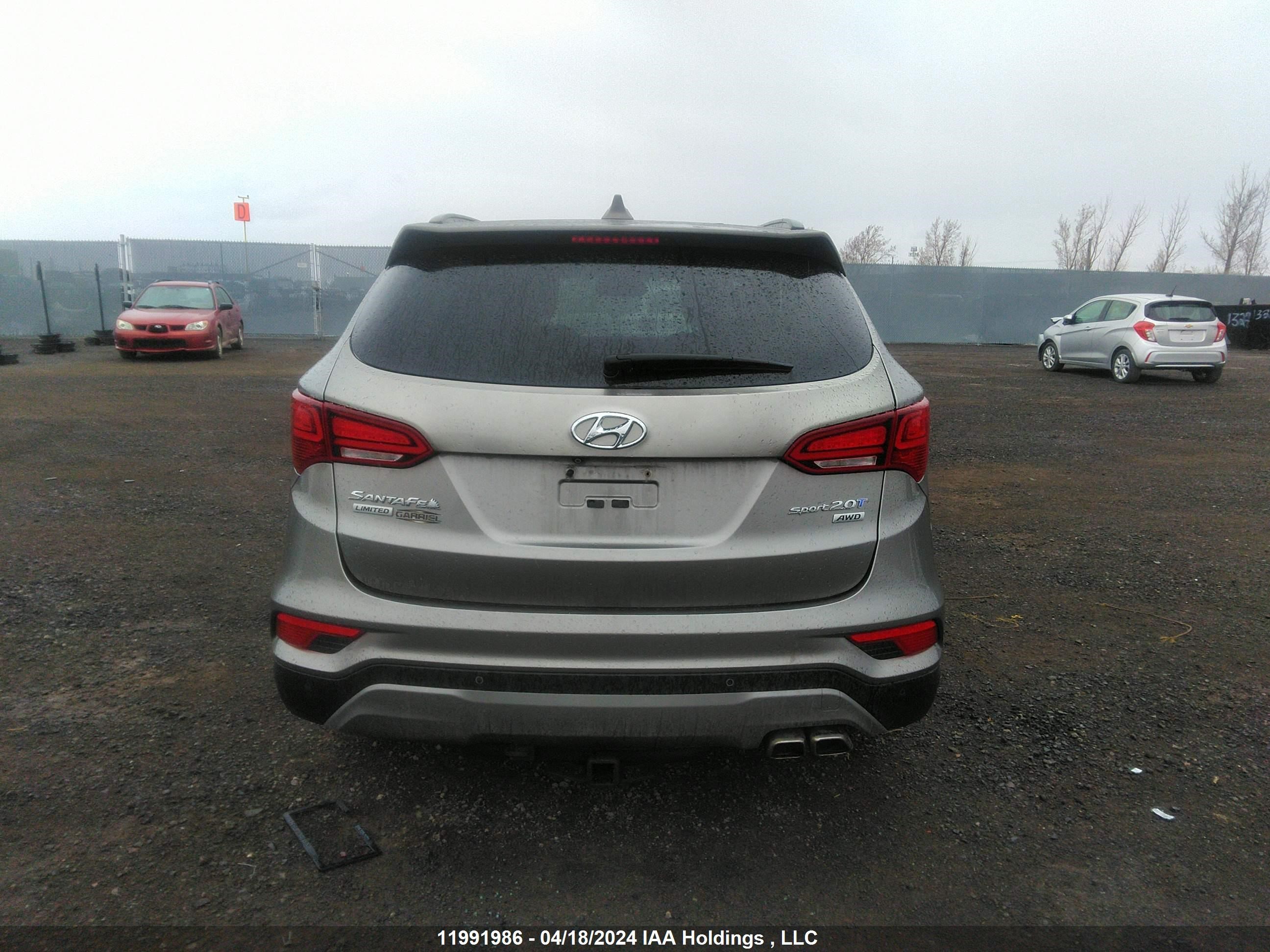 Photo 15 VIN: 5XYZUDLA2HG402583 - HYUNDAI SANTA FE 