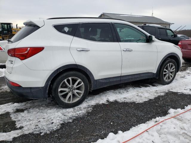 Photo 2 VIN: 5XYZUDLA3GG358785 - HYUNDAI SANTA FE 