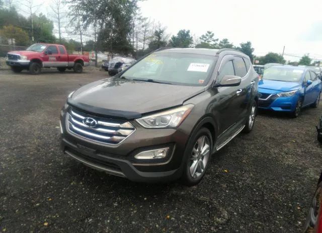 Photo 1 VIN: 5XYZUDLA4DG093631 - HYUNDAI SANTA FE 