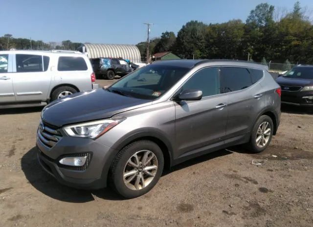 Photo 1 VIN: 5XYZUDLA4FG302238 - HYUNDAI SANTA FE SPORT 