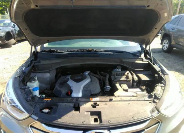 Photo 9 VIN: 5XYZUDLA4FG302238 - HYUNDAI SANTA FE SPORT 