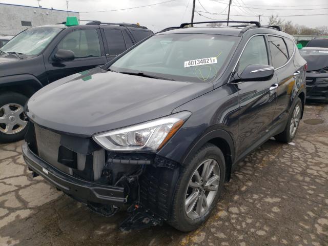 Photo 1 VIN: 5XYZUDLA4GG308316 - HYUNDAI SANTA FE S 