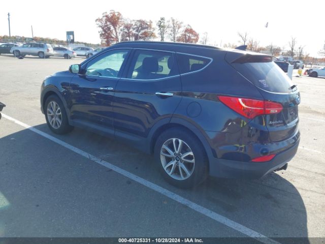 Photo 2 VIN: 5XYZUDLA5FG304841 - HYUNDAI SANTA FE 