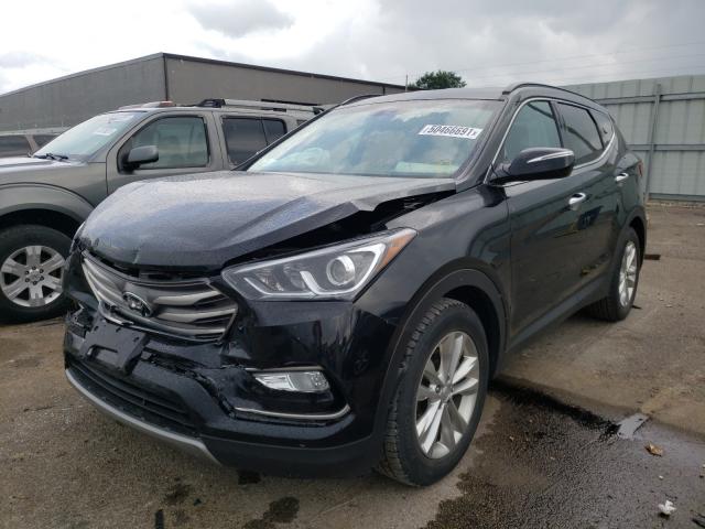 Photo 1 VIN: 5XYZUDLA7JG536768 - HYUNDAI SANTA FE 