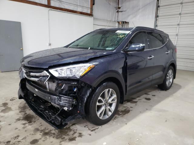 Photo 1 VIN: 5XYZUDLA8GG333347 - HYUNDAI SANTA FE S 