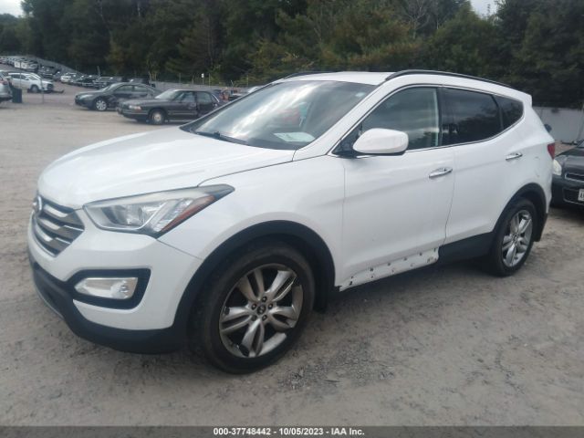 Photo 1 VIN: 5XYZUDLAXDG027018 - HYUNDAI SANTA FE 