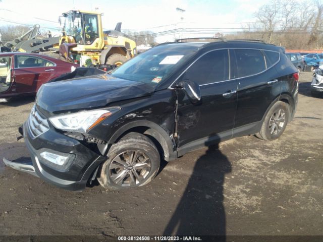 Photo 1 VIN: 5XYZUDLB0GG318172 - HYUNDAI SANTA FE SPORT 