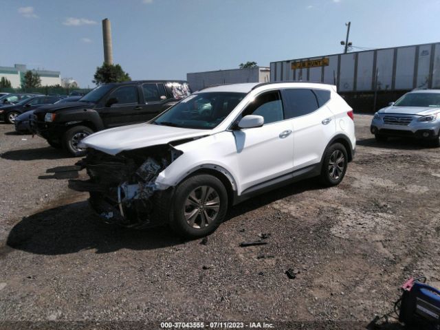 Photo 1 VIN: 5XYZUDLB0GG324215 - HYUNDAI SANTA FE SPORT 