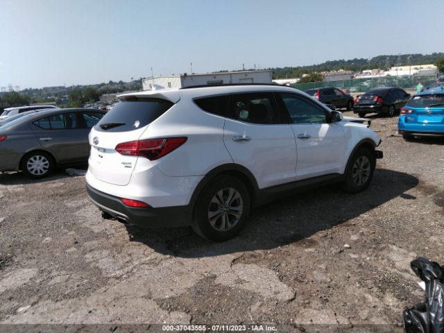 Photo 3 VIN: 5XYZUDLB0GG324215 - HYUNDAI SANTA FE SPORT 