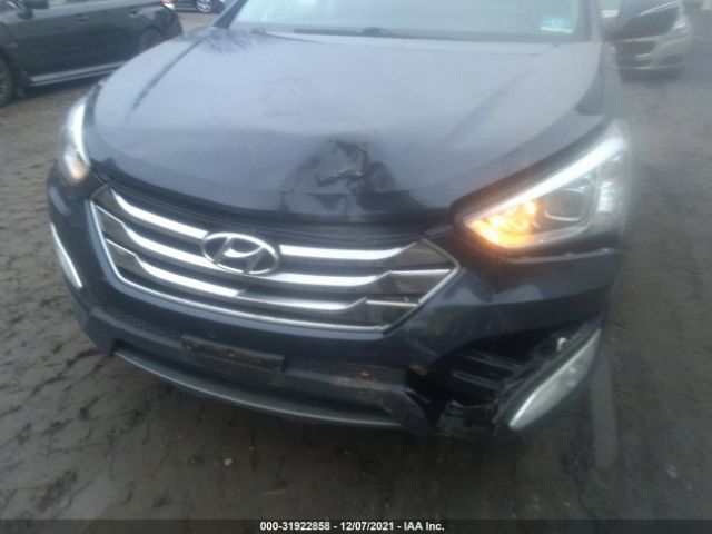 Photo 5 VIN: 5XYZUDLB0GG325042 - HYUNDAI SANTA FE SPORT 