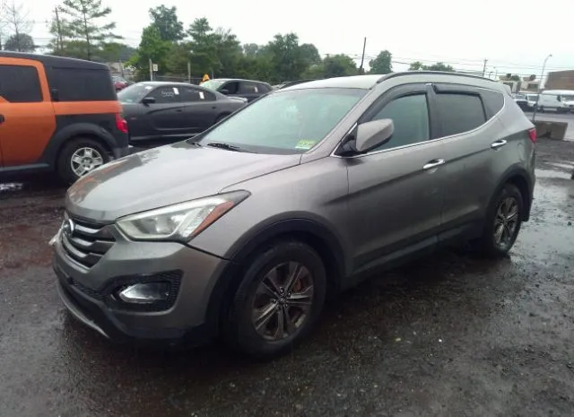 Photo 1 VIN: 5XYZUDLB1FG238278 - HYUNDAI SANTA FE SPORT 