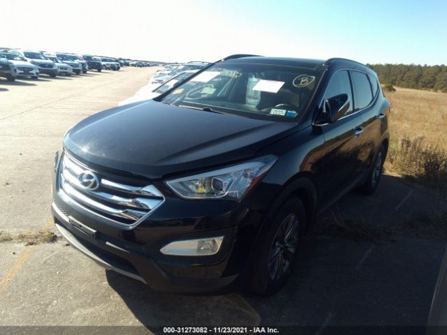 Photo 1 VIN: 5XYZUDLB1GG312168 - HYUNDAI SANTA FE SPORT 