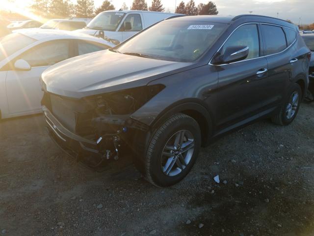 Photo 1 VIN: 5XYZUDLB1JG512703 - HYUNDAI SANTA FE SPORT 