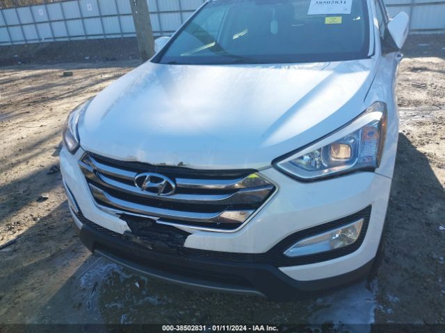 Photo 5 VIN: 5XYZUDLB2FG238595 - HYUNDAI SANTA FE SPORT 