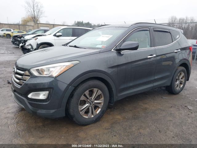 Photo 1 VIN: 5XYZUDLB2GG311787 - HYUNDAI SANTA FE SPORT 