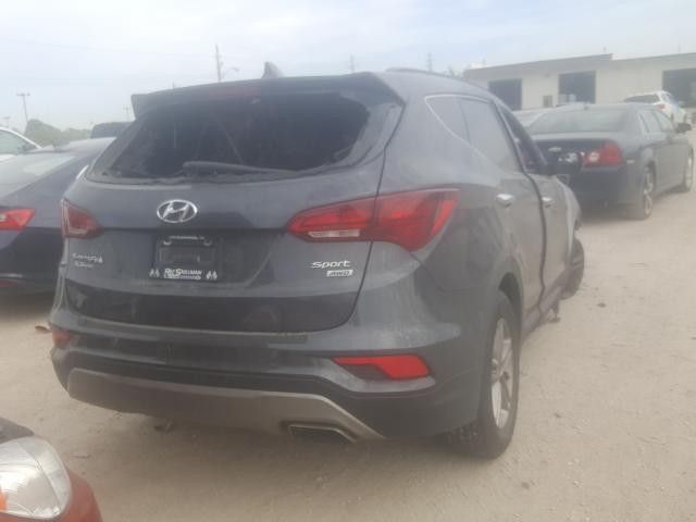 Photo 3 VIN: 5XYZUDLB2JG505792 - HYUNDAI SANTA FE S 