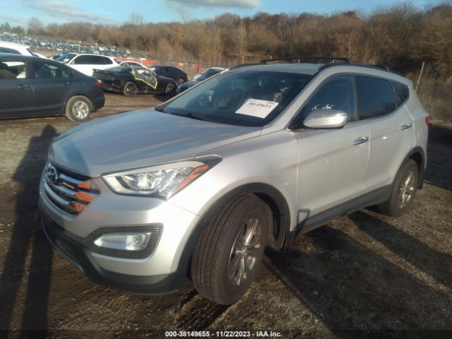 Photo 1 VIN: 5XYZUDLB3EG213803 - HYUNDAI SANTA FE SPORT 