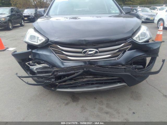 Photo 5 VIN: 5XYZUDLB6FG291185 - HYUNDAI SANTA FE SPORT 