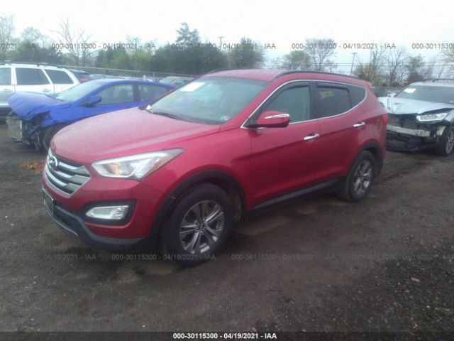 Photo 1 VIN: 5XYZUDLB6GG313056 - HYUNDAI SANTA FE SPORT 