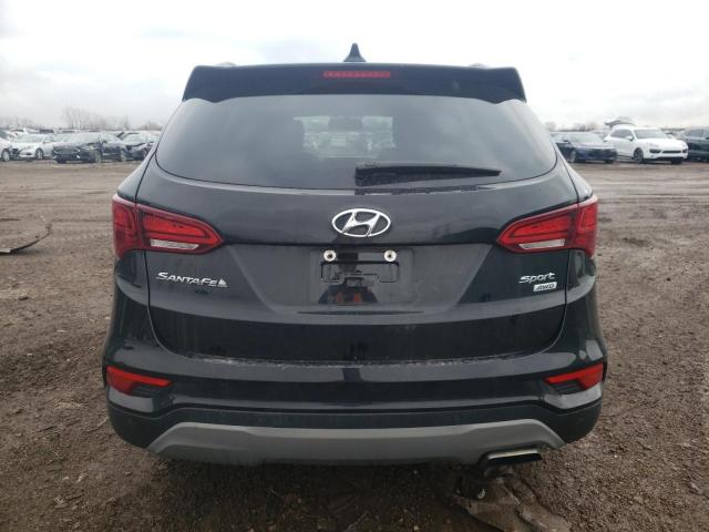 Photo 5 VIN: 5XYZUDLB6JG554977 - HYUNDAI SANTA FE S 