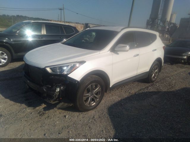 Photo 1 VIN: 5XYZUDLB7GG311512 - HYUNDAI SANTA FE SPORT 