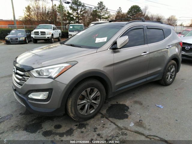 Photo 1 VIN: 5XYZUDLB7GG312823 - HYUNDAI SANTA FE SPORT 