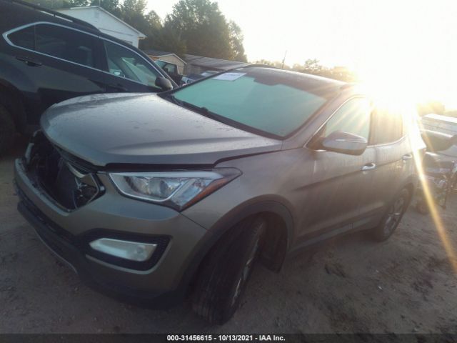 Photo 1 VIN: 5XYZUDLB7GG337320 - HYUNDAI SANTA FE SPORT 