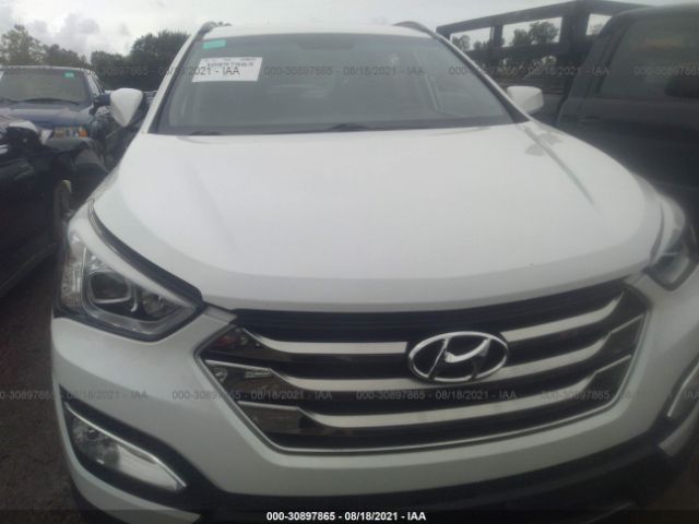 Photo 5 VIN: 5XYZUDLB7GG339066 - HYUNDAI SANTA FE SPORT 