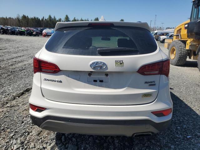 Photo 5 VIN: 5XYZUDLB7HG385501 - HYUNDAI SANTA FE S 