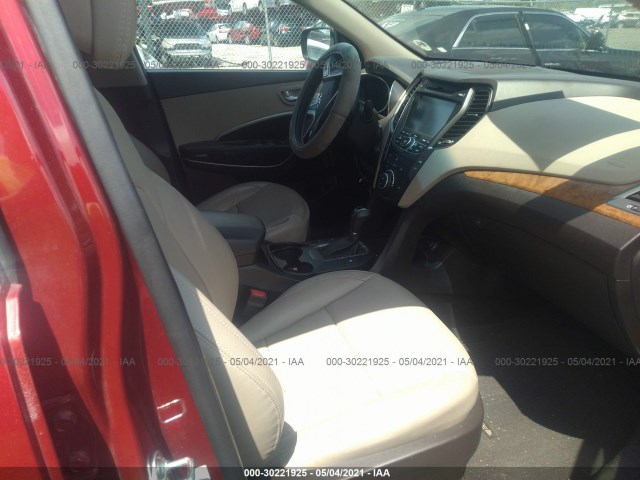 Photo 4 VIN: 5XYZUDLB8GG319697 - HYUNDAI SANTA FE SPORT 