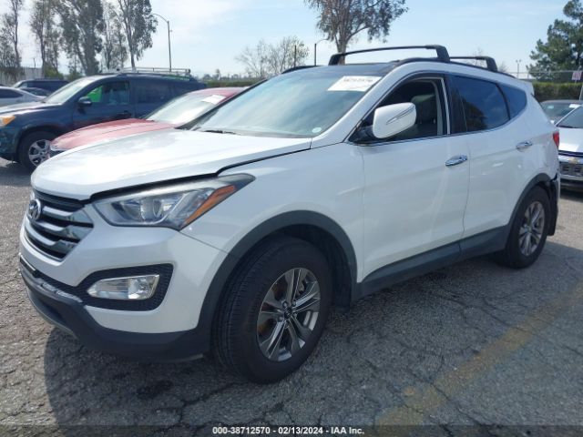 Photo 1 VIN: 5XYZUDLB8GG327461 - HYUNDAI SANTA FE SPORT 