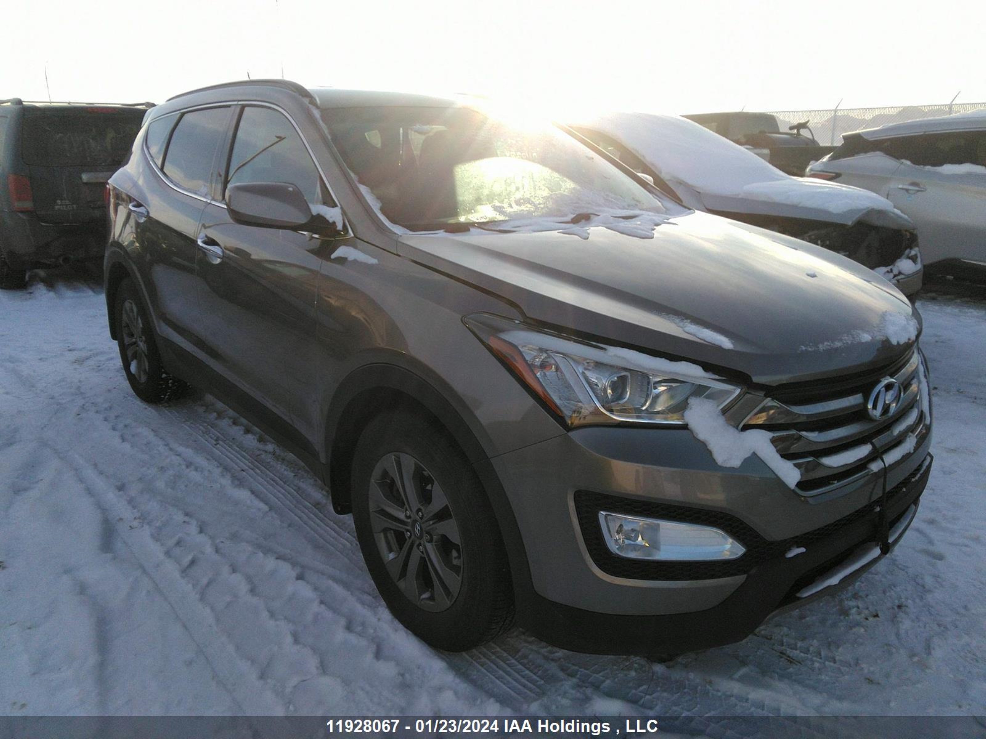 Photo 0 VIN: 5XYZUDLB8GG338220 - HYUNDAI SANTA FE 