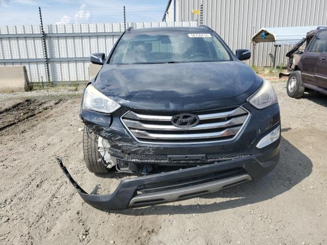 Photo 4 VIN: 5XYZUDLB9FG241395 - HYUNDAI SANTA FE 