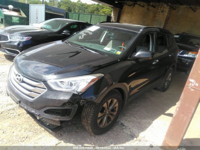 Photo 1 VIN: 5XYZUDLB9FG284585 - HYUNDAI SANTA FE SPORT 