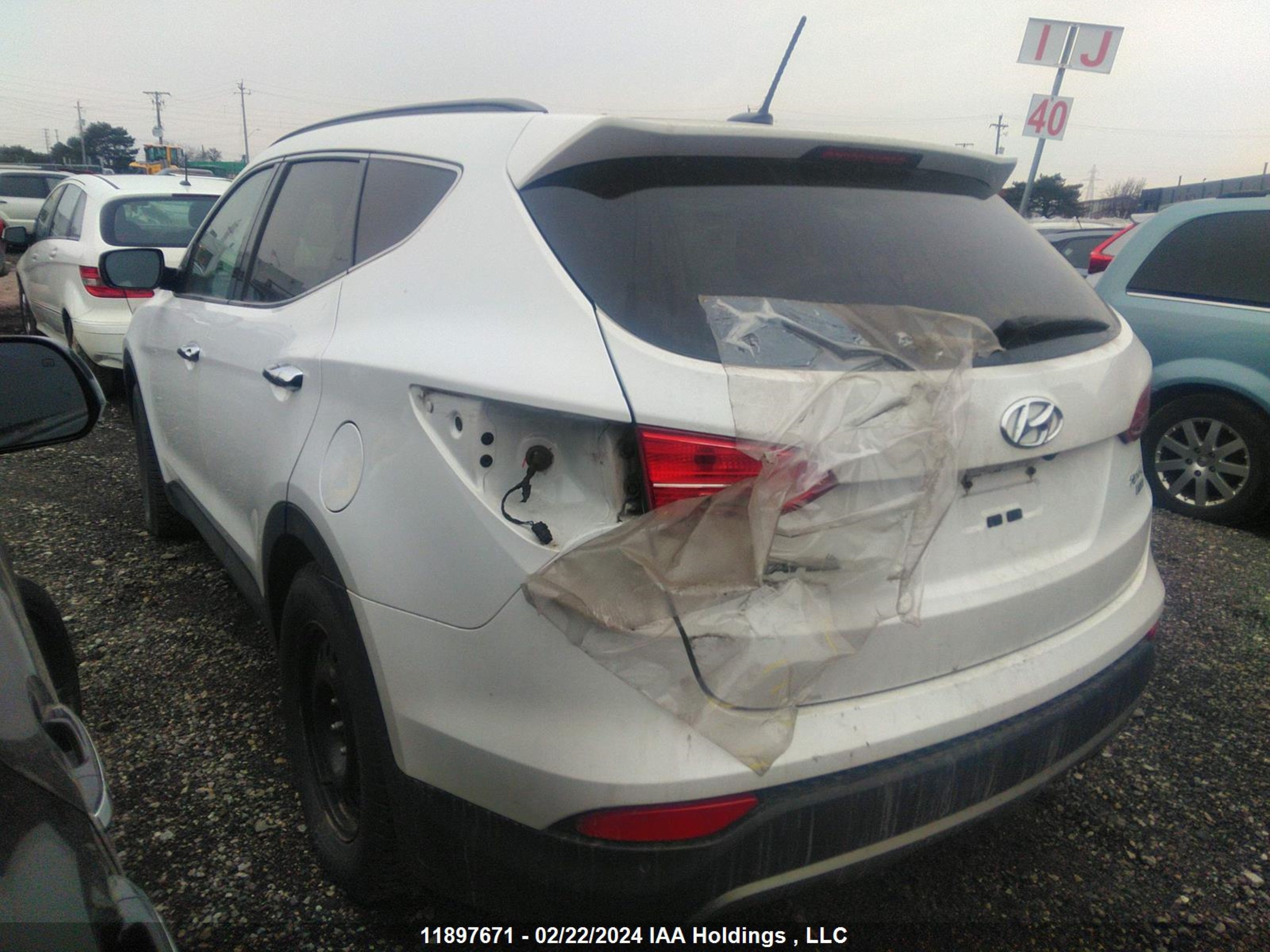 Photo 2 VIN: 5XYZUDLB9GG323418 - HYUNDAI SANTA FE 