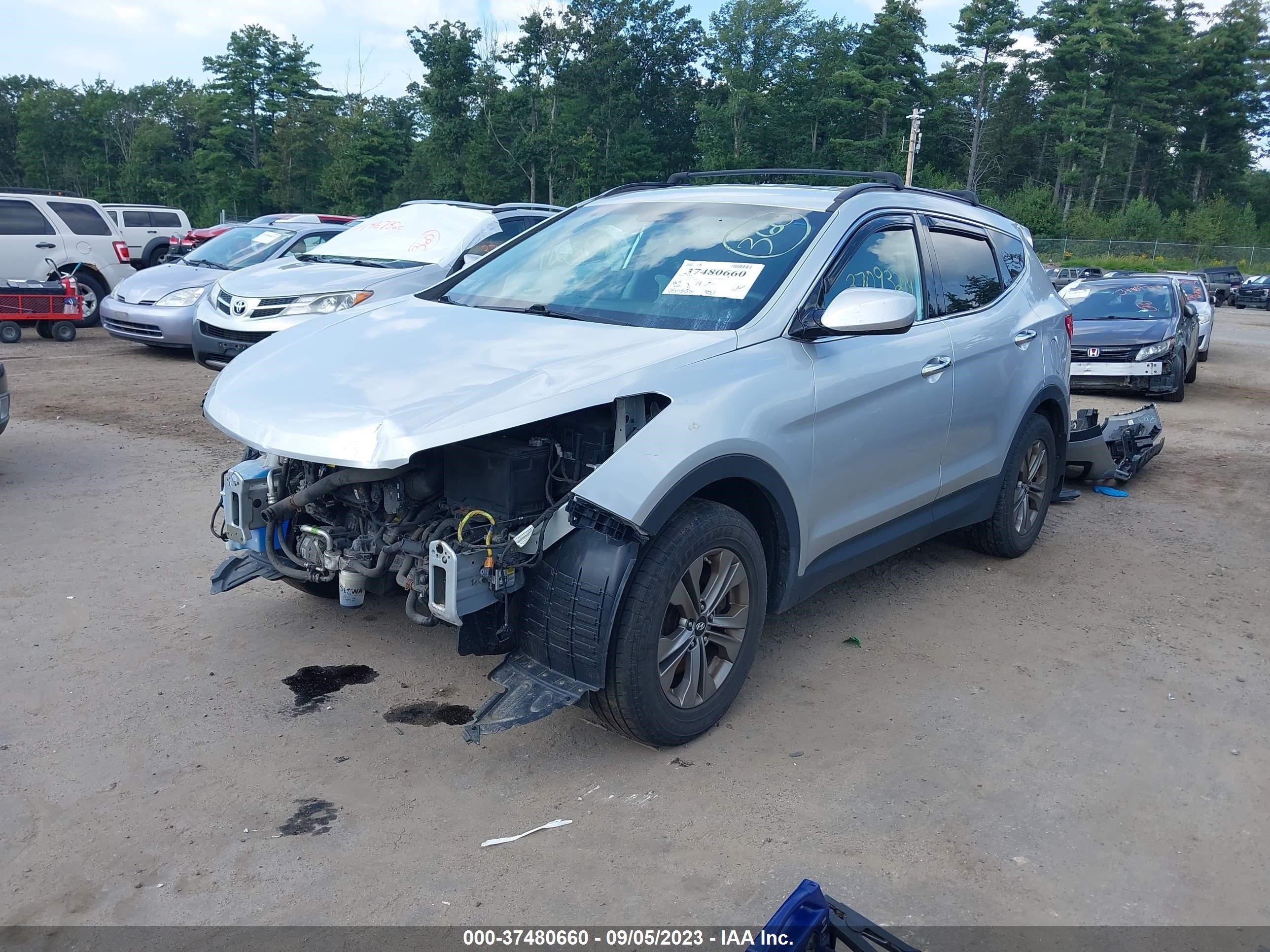 Photo 1 VIN: 5XYZUDLBXGG330409 - HYUNDAI SANTA FE 