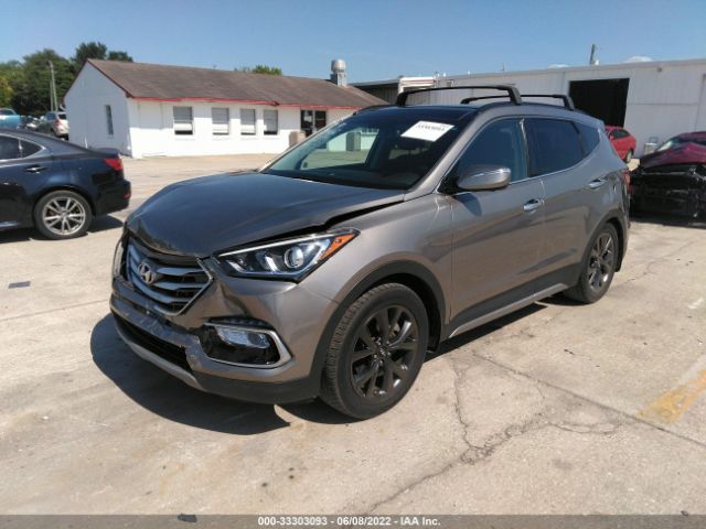 Photo 1 VIN: 5XYZW4LA2JG568179 - HYUNDAI SANTA FE SPORT 