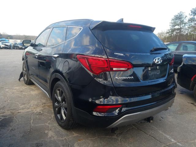 Photo 2 VIN: 5XYZW4LA3HG490103 - HYUNDAI SANTA FE S 